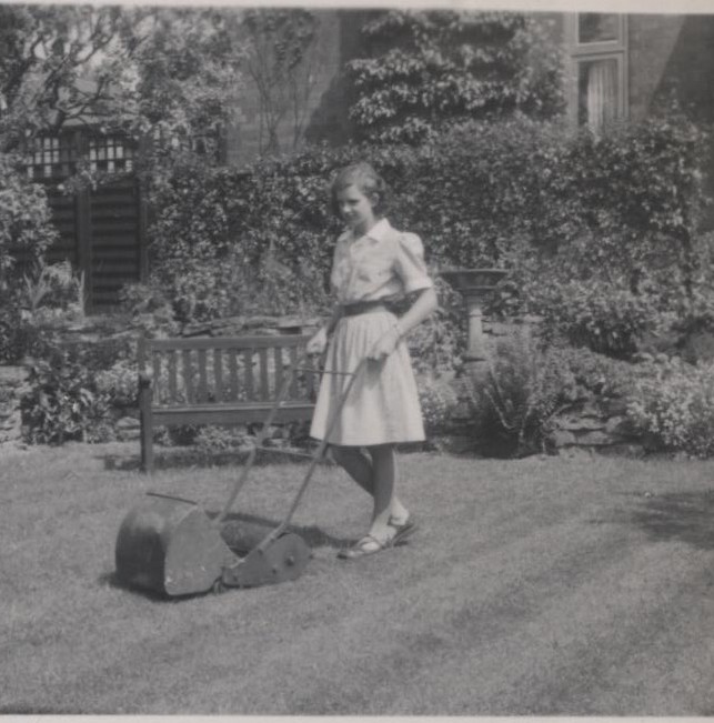 Gill Hughes tending to her Nottingham garden c. 1950